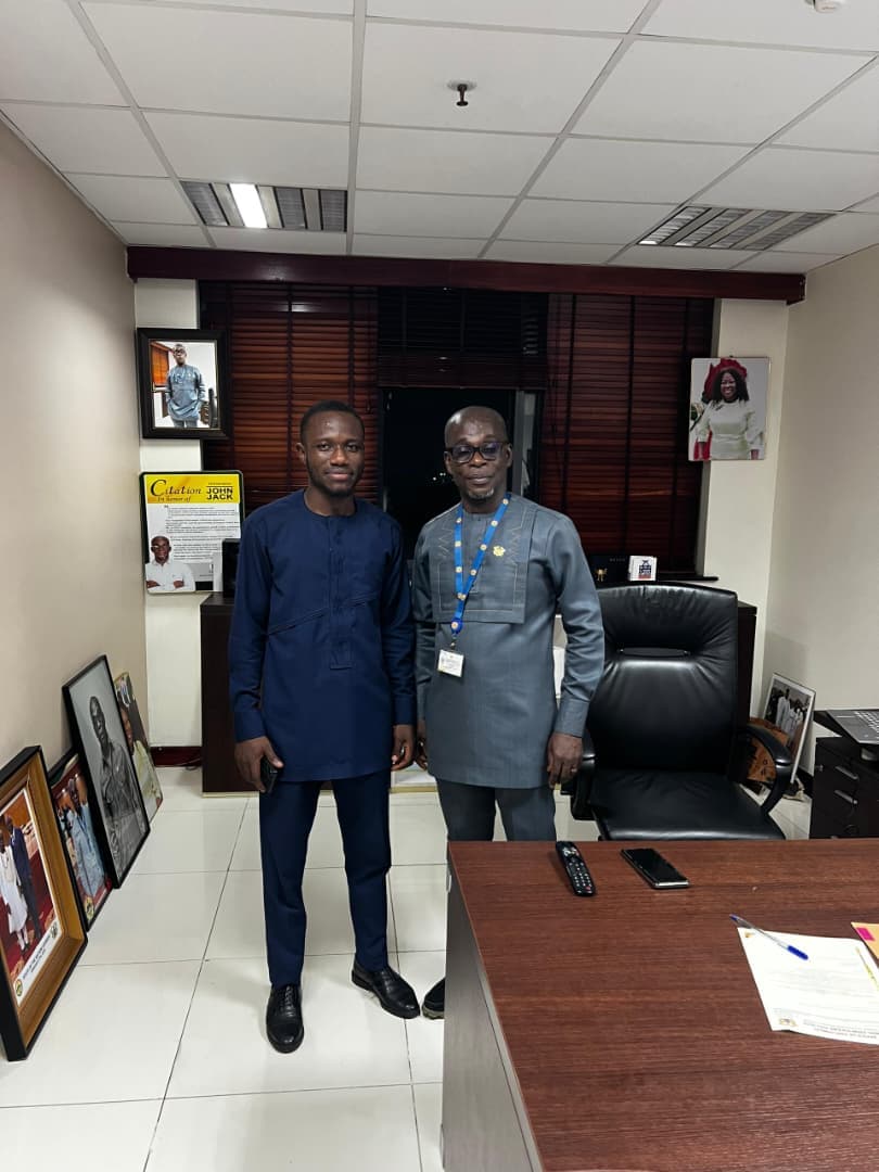 Kenneth Adu-Akwabeng in a professional office engagement.